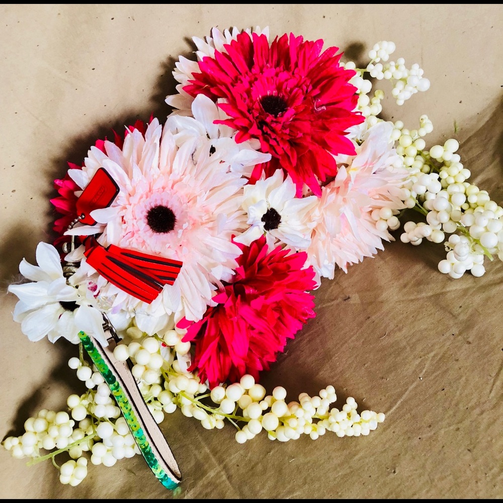 Flowered Coach clutch